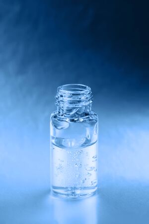 Macro photo of bottle with fluid collagen of hyaluronic acidの写真素材