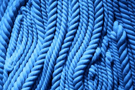 Backdrop made with ropes in blue trendy color.の写真素材