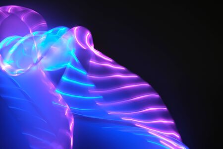 Abstract background of purple and blue neon lights in motion. Backdrop for your design.の写真素材