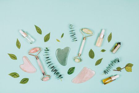 Facial massage kit. Face roller and gua sha massager made from natural stones.の写真素材