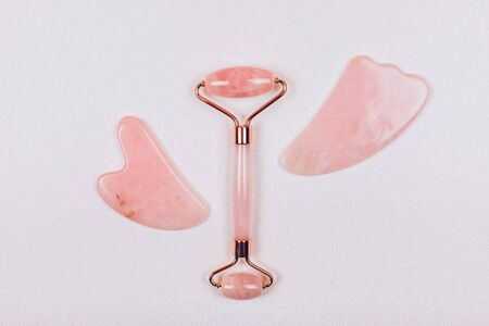 Facial massage kit. Face roller and gua sha massager made from natural stones.