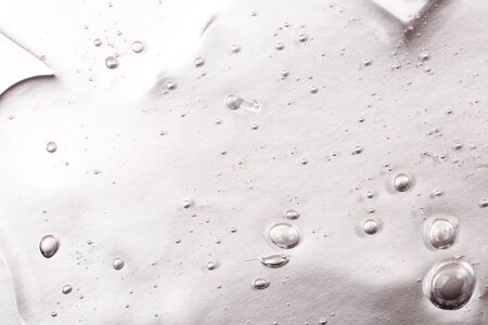 Hyaluronic acid gel. Textured background with oxygen bubblesの写真素材