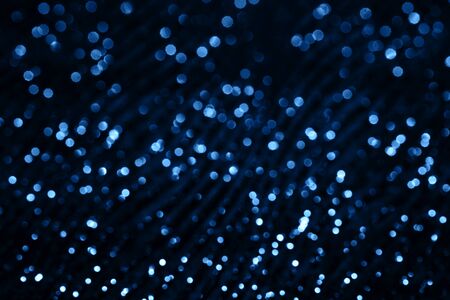 Blue sparkling abstract background. Festive concept. Color of the year 2020 concept.の写真素材