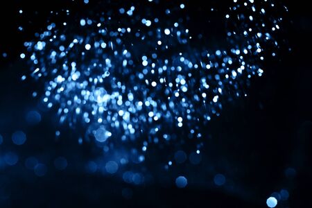 Blue sparkling abstract background. Festive concept. Color of the year 2020 concept.の写真素材