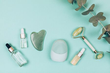 Facial massage kit. Face roller and gua sha massager made from natural stones.の写真素材