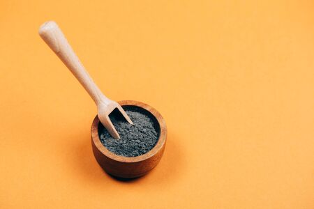 Home skin care. Grey clay with wooden spoon. Modern apothecary. Flat lay style.の写真素材