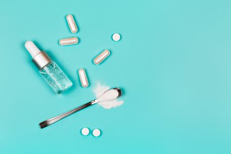 Different types of collagen. Powder, capsules, tablets and fluid.の写真素材