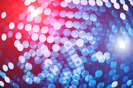 Rows of colorful lights on black background. Festive concept.の写真素材