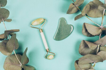 Facial massage kit. Face roller and gua sha massager made from natural stones.の写真素材