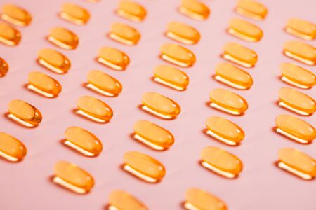 Capsules with oils for beauty. Concept of modern health-care. Flat lay style.