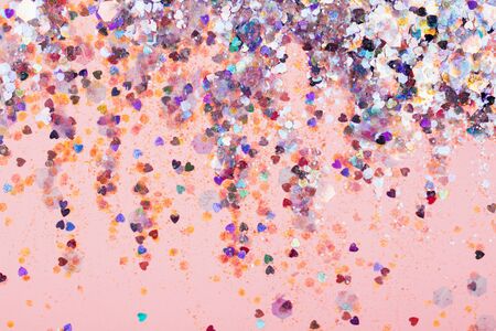 Falling confetti on bright background. Holiday and party concept.の写真素材