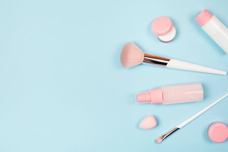 Care cosmetics in bottles on a delicate blue background.の写真素材
