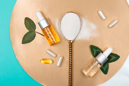 Different types of collagen. Powder, capsules, tablets and fluid.の写真素材