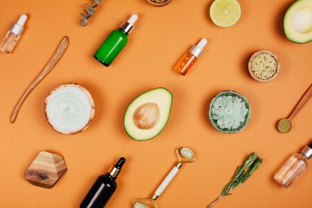 Modern accessories and herbal cosmetics for natural face care. Flat lay style.の写真素材