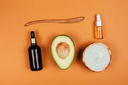 Modern accessories and herbal cosmetics for natural face care. Flat lay style.の写真素材