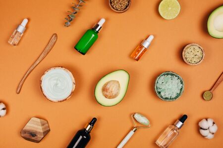 Modern accessories and herbal cosmetics for natural face care. Flat lay style.の写真素材