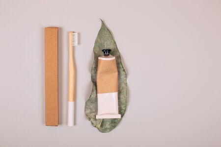Zero waste self-care products. Bamboo toothbrush, toothpaste, tooth powder and flax. Flat lay style.の写真素材