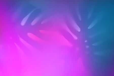 Contrast shadows of monstera leaves in trendy duotone neon backlight. Abstract backdrop for your design.の写真素材
