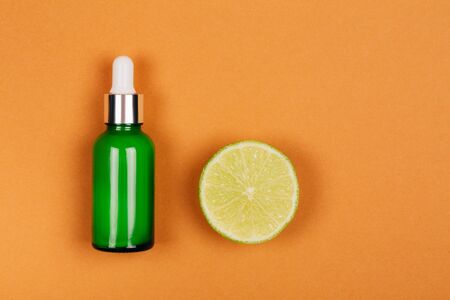Natural face oil with vitamin C. Flat lay style.の写真素材