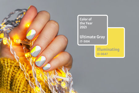 Perfect minimalistic manicure with geometry in trendy colors of year 2021.の写真素材