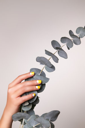 Perfect minimalistic manicure with geometry in trendy colors of yearの写真素材
