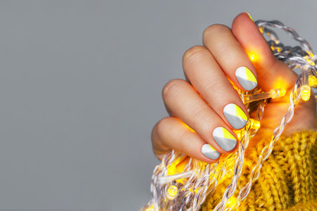 Perfect minimalistic manicure with geometry in trendy colors of year 2021.の写真素材