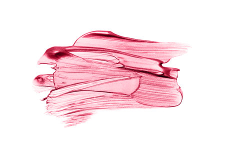 Beautiful textured red melallic strokes isolated on white background. Demonstrating Viva Magenta - trendy color of the year 2023の写真素材