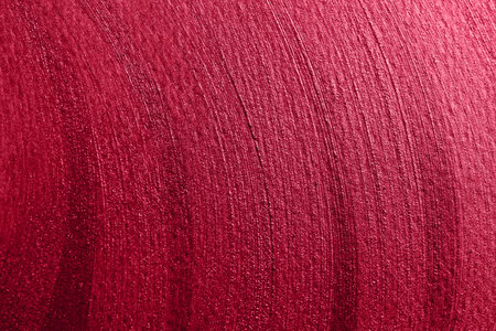 red shining stroke texture made with brush and paint hand drawn. Demonstrating Viva Magenta - trendy color of the year 2023の写真素材