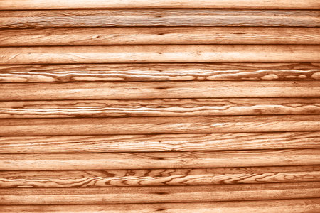 Old vintage bright textured wooden surface. Can be used like backdrop. Rustic style. Demonstrating color of 2024 year - peach.の写真素材