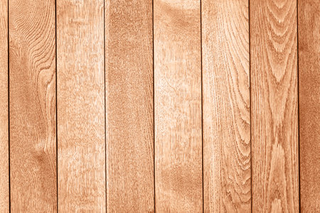 Wall texture background made with brown perfect planks. Demonstrating color of 2024 year - peach.の写真素材