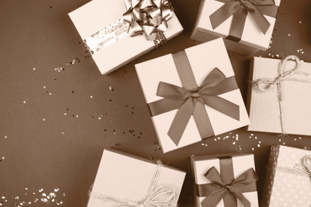 Elegant gift boxes arranged with shimmering bows for special celebrationsの写真素材