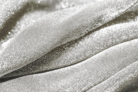 Shiny silver glitter fabric textile surface shimmering light. Color of 2026 year dancer in the white cloudの写真素材