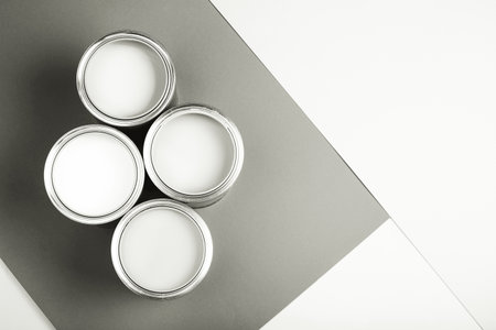White paint cans on monochrome background for home renovation. Color of 2026 year dancerの写真素材