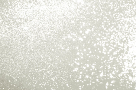 White glitter sparkling light bokeh abstract background. Color of 2026 year dancer in the white cloudの写真素材