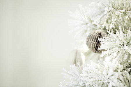 White frosted christmas tree decorating for winter holidays.の写真素材