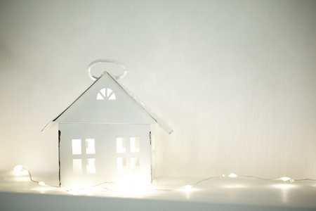 White house lantern illuminating cozy festive light.の写真素材