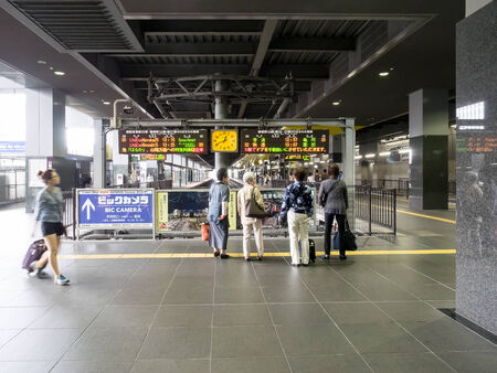 Kyoto , Japan - June 27, 2014 : Senior group female looking at route map time of train at Kyoto stationのeditorial素材