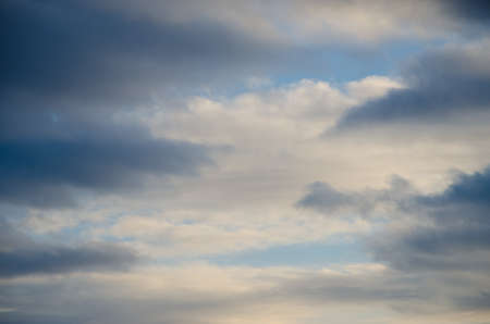 storm and rain clouds at sunset in the evening