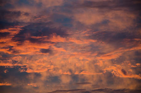 saturated colors colorful sunset . Summers are warm and beautiful sunset . Clouds filled with different colors of the rainbow . the sky as if drawn by an artist's brushの写真素材
