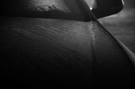 the car is covered in drops after heavy rain.
