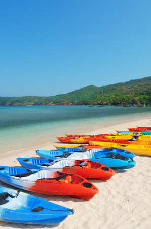 Colourful kayaks on the beach. の写真素材