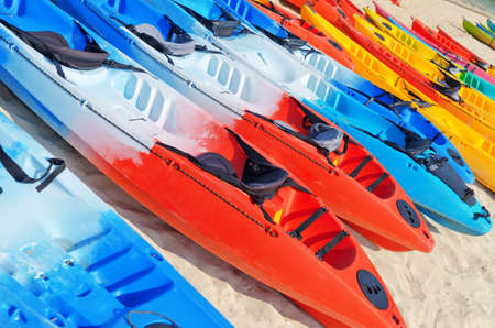 Colourful kayaks on the beach. の写真素材