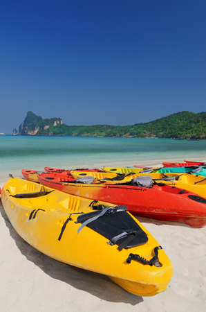 Colourful kayaks on the beach. の写真素材