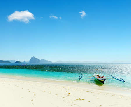 Tropical white sand beach and blue sky.の写真素材