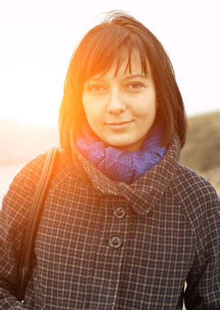 Woman in sunset. Outdoor portrait.の写真素材