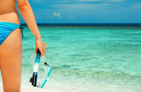 Beautiful woman with snorkeling equipment.の写真素材