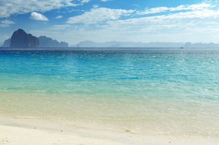 Tropical white sand beach and blue sky.の写真素材