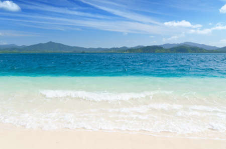 Tropical white sand beach and blue sky.の写真素材