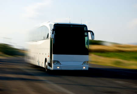 white bus on the roadの写真素材