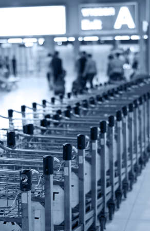 Modern airport in Bangkok. Luggage trolley'sの写真素材